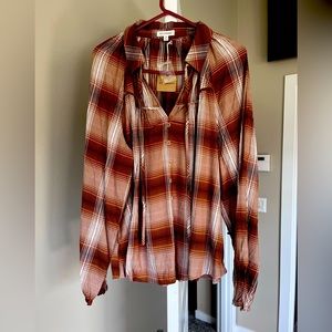 Size Medium, woman’s blouse
